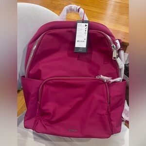 Brand New Tumi Rosie Backpack color Fuschia